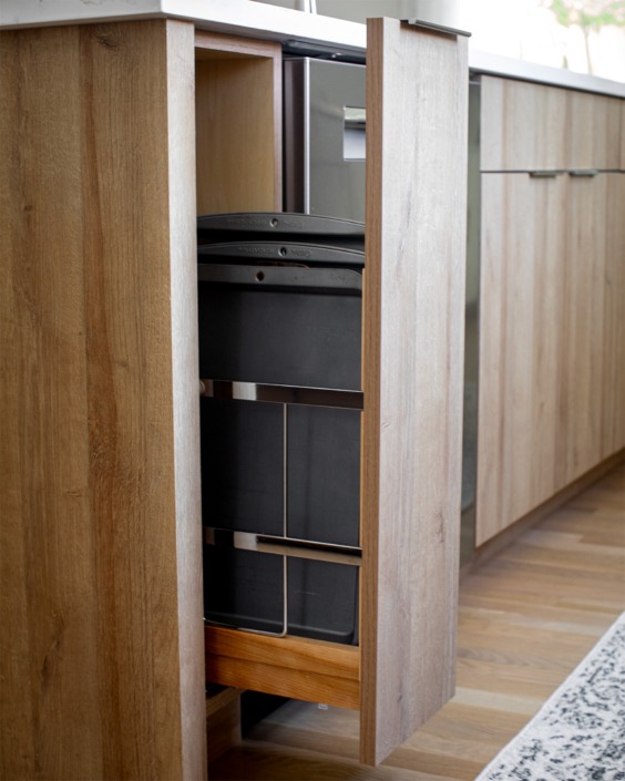 custom storage in Raleigh kitchen remodel with upright sheet pan rollout in the island