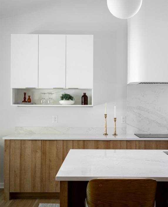 modern flat panel white and wood kitchen cabinets in Raleigh NC remodel with open shelf under the upper cabinet