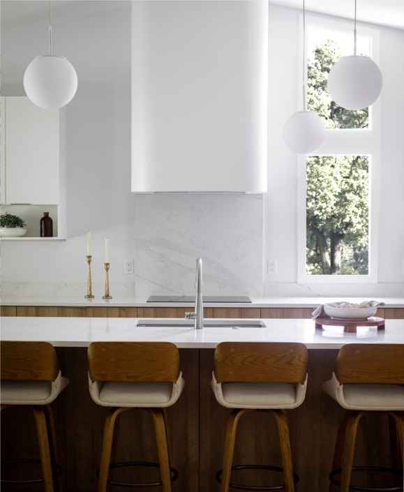 smooth eased edge scandinavian style vent hood in a open concept warm kitchen remodel in Raleigh NC.