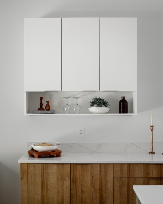 open shelf under white flat panel cabinet in Raleigh kitchen remodel