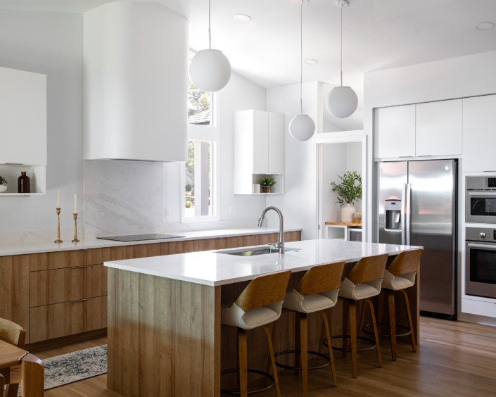 Modern Raleigh NC kitchen remodel with tons of natural light and warm wood tones